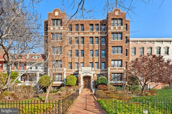 a view of a building with a garden