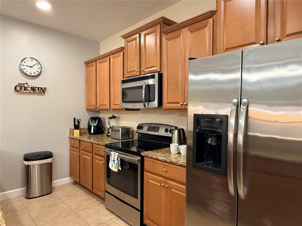 8977 Bismarck Palm Road Kissimmee, FL 34747 - Photo 4 of 60
