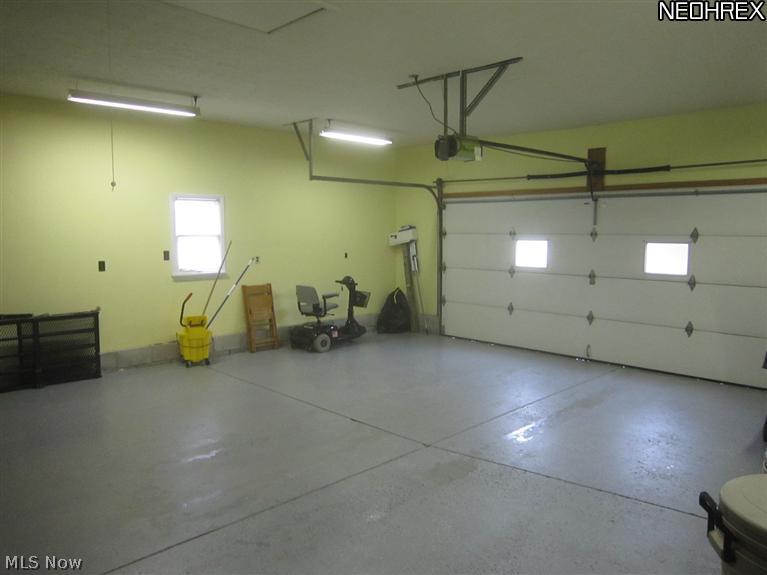 6220 South Raccoon Road Canfield, OH 44406 - Photo 10 of 13 View of attached large heated garage taken from doorway to utility/laundry room.