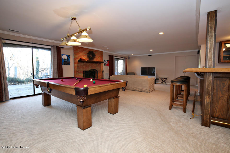 1005 Devon Road Goshen, KY 40026 - Photo 40 of 55 A view of the Great Room shows the owners' pool table, the fireplace & the large bar.