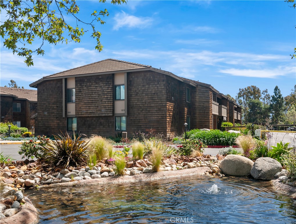 33852 Del Obispo Street, Unit 2 Dana Point, CA 92629 - Photo 24 of 30 a front view of a house with garden