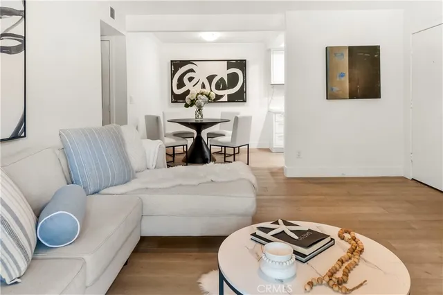 a bedroom with bed and a couch