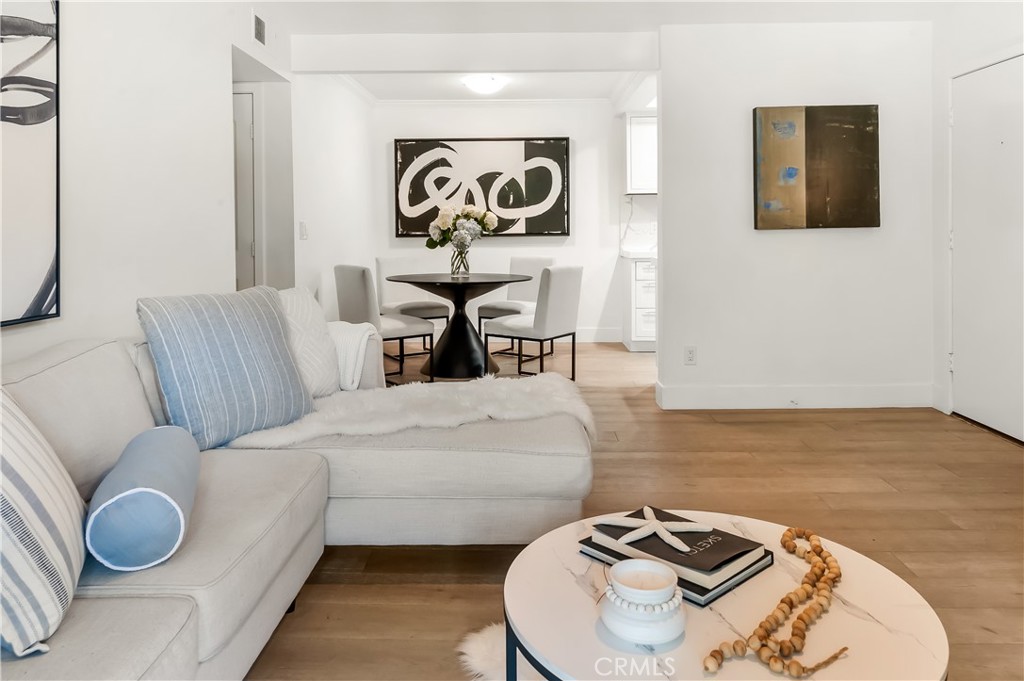 33852 Del Obispo Street, Unit 2 Dana Point, CA 92629 - Photo 3 of 30 a bedroom with bed and a couch