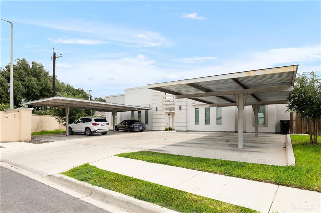 1305 Alta Vista Drive, Unit 4 Weslaco, TX 78596 - Photo 1 of 13 View of covered parking lot