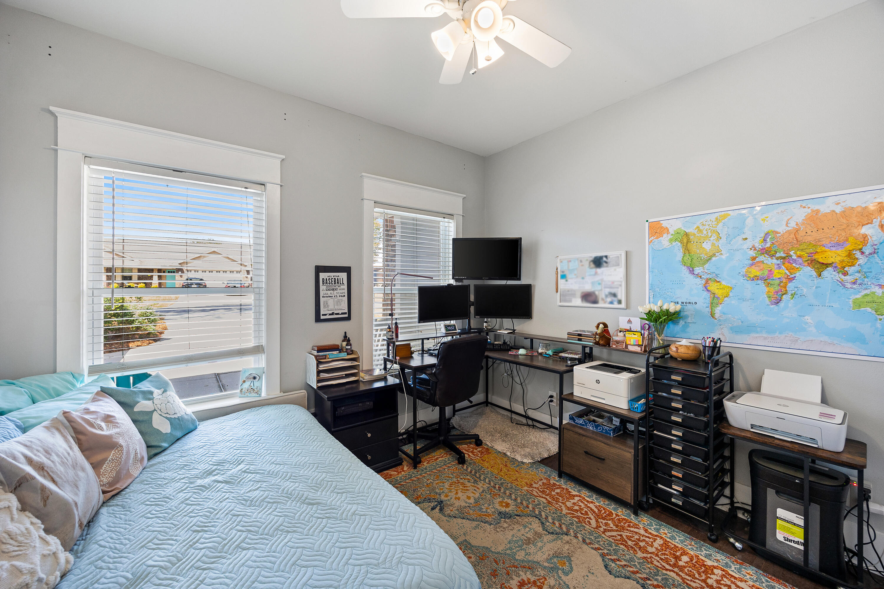 804 Symphony Way Freeport, FL 32439 - Photo 21 of 34 a living room with furniture a flat screen tv and a window