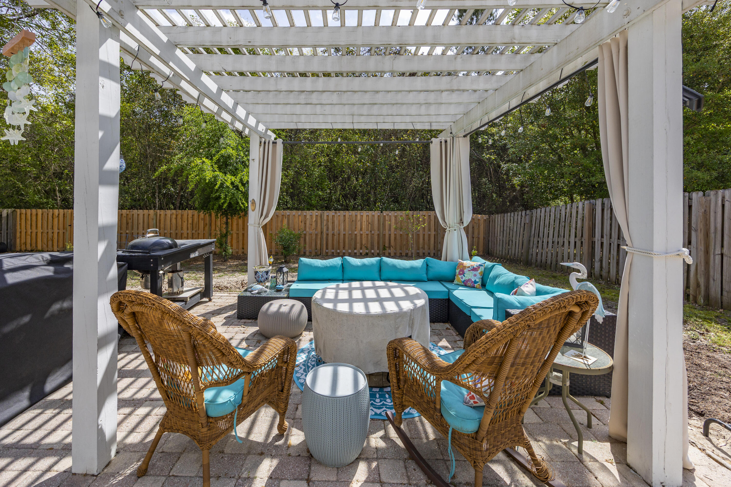 804 Symphony Way Freeport, FL 32439 - Photo 28 of 34 a view of an outdoor sitting area with furniture and garden view