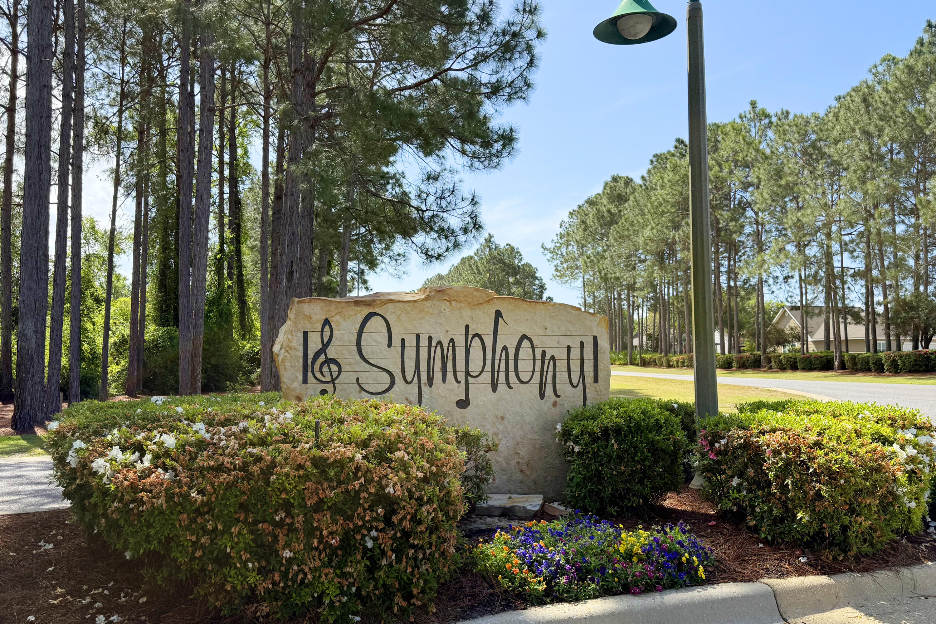 804 Symphony Way Freeport, FL 32439 - Photo 33 of 34 a sign on the side of the road