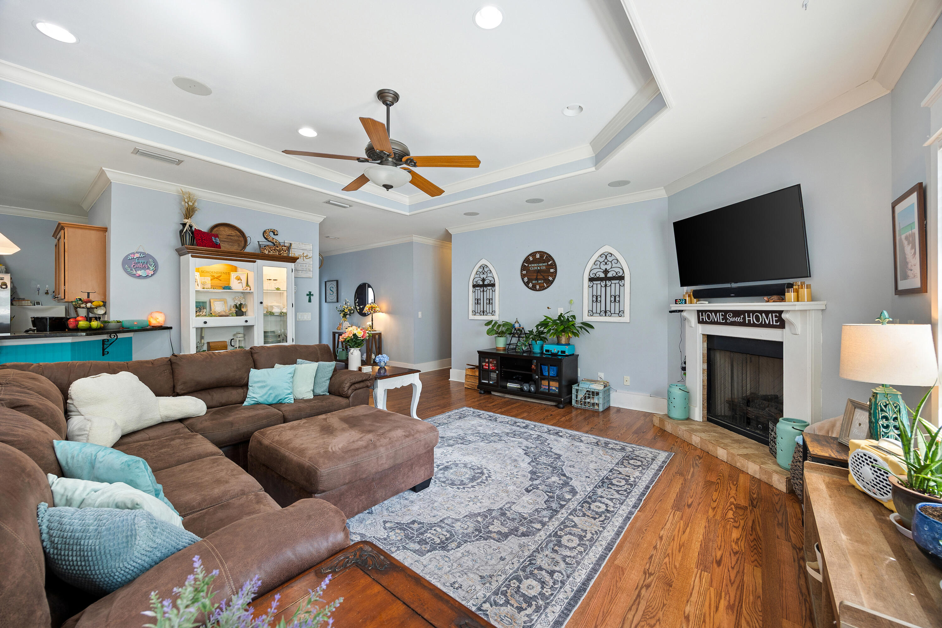 804 Symphony Way Freeport, FL 32439 - Photo 4 of 34 a living room with furniture and a flat screen tv