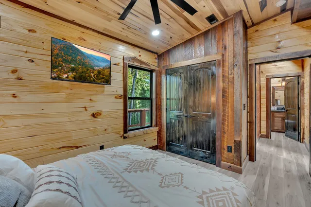 a bedroom with furniture and a bed