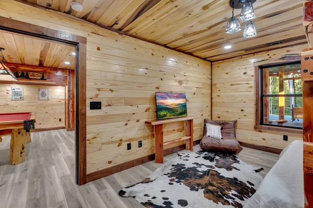 a room with wooden shelves and wooden walls