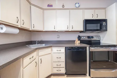$599,999 | 100 Daly Boulevard, Unit 408, Oceanside, NY 11572