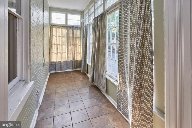 a view of a room with windows