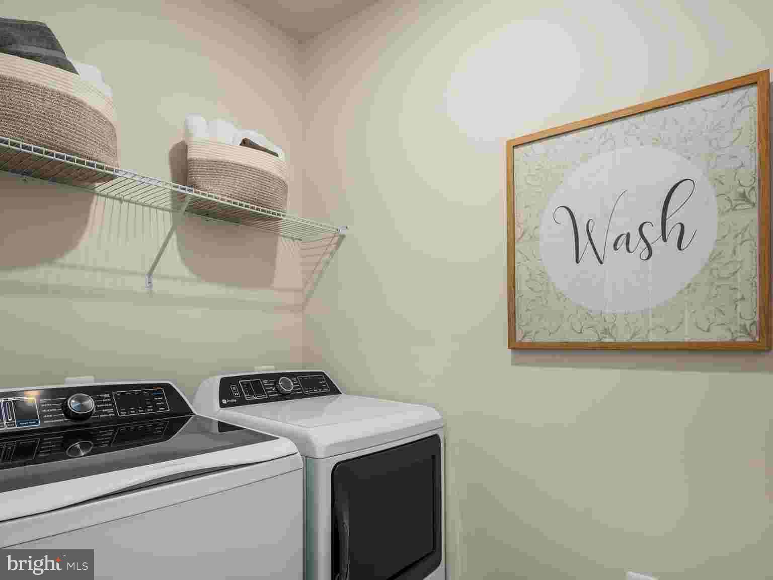 6558 Stream Song Court Columbia, MD 21044 - Photo 19 of 20 a utility room with dryer and washer