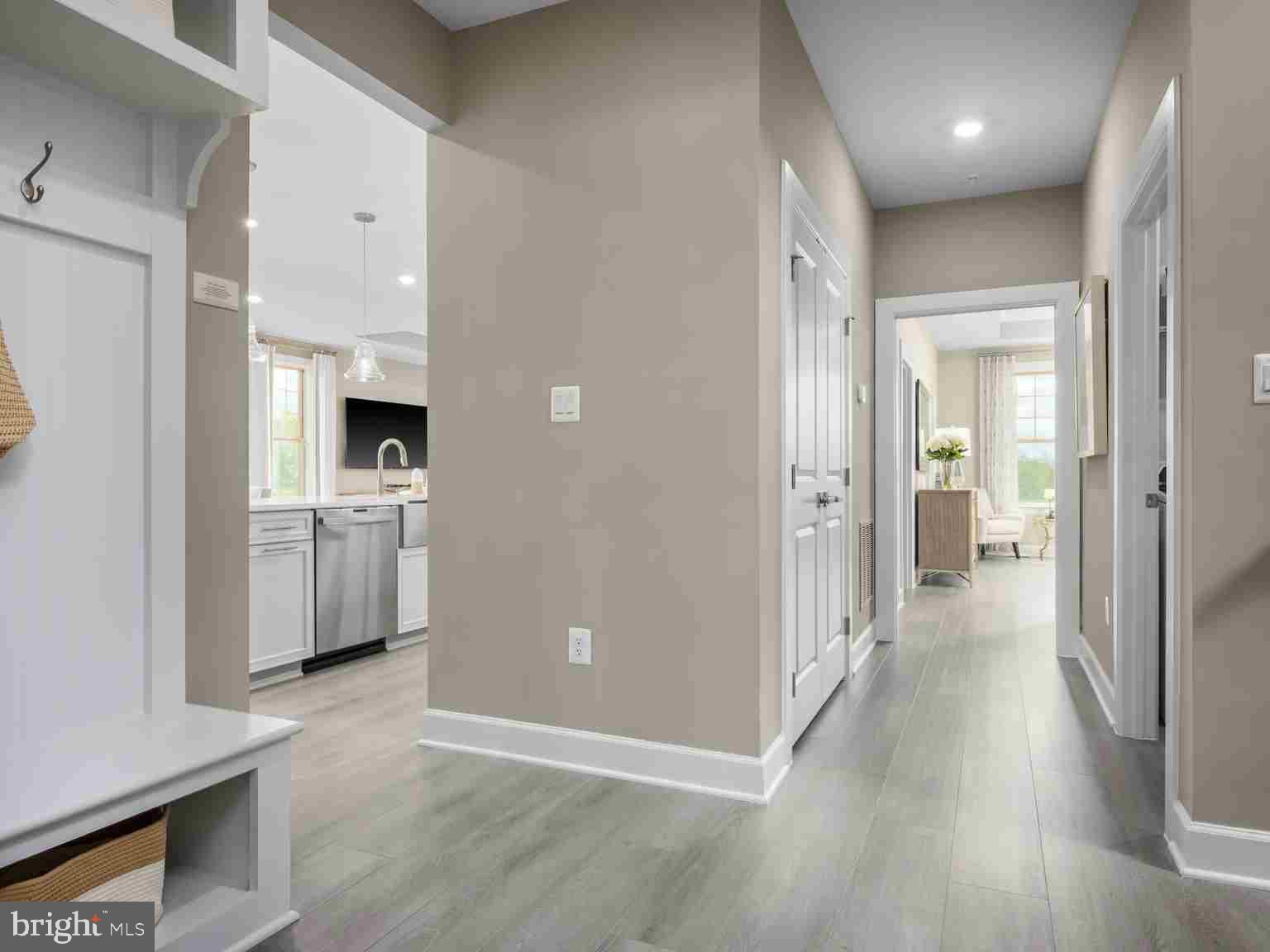 6558 Stream Song Court Columbia, MD 21044 - Photo 9 of 20 a view of a kitchen with a sink and a stove top oven
