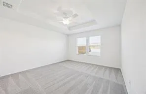 an empty room with a empty space and a window
