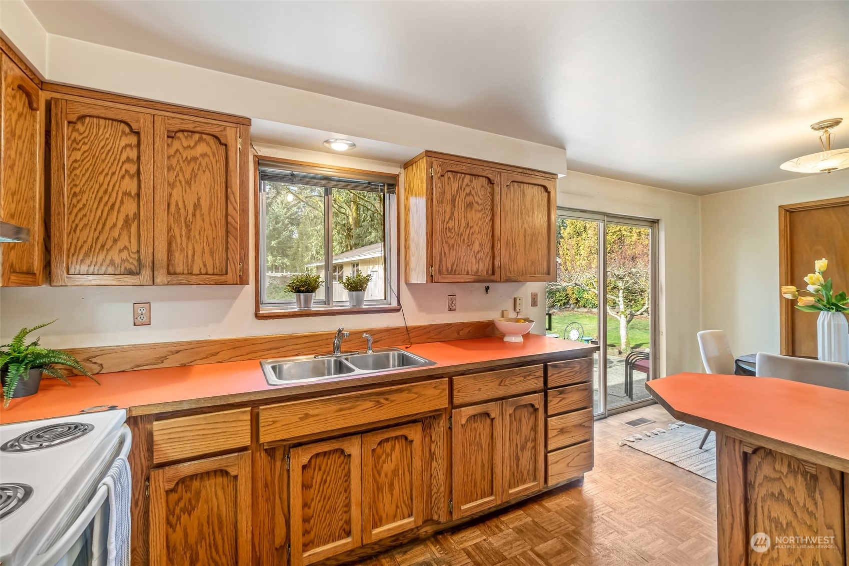 24204 2nd Place West Bothell, WA 98021 - Photo 13 of 34 a kitchen with a sink and a window
