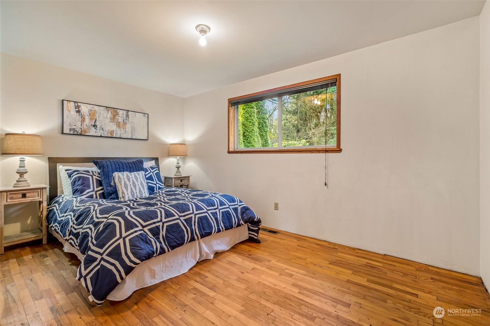 24204 2nd Place West Bothell, WA 98021 - Photo 16 of 34 a bedroom with a bed and window