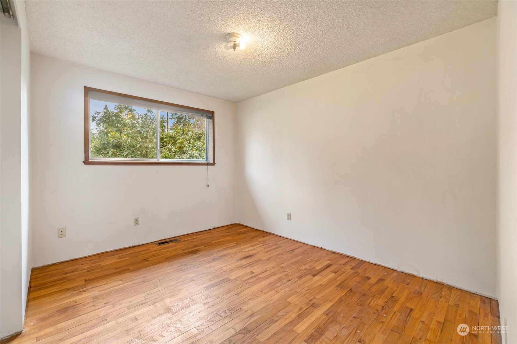 24204 2nd Place West Bothell, WA 98021 - Photo 20 of 34 an empty room with a window