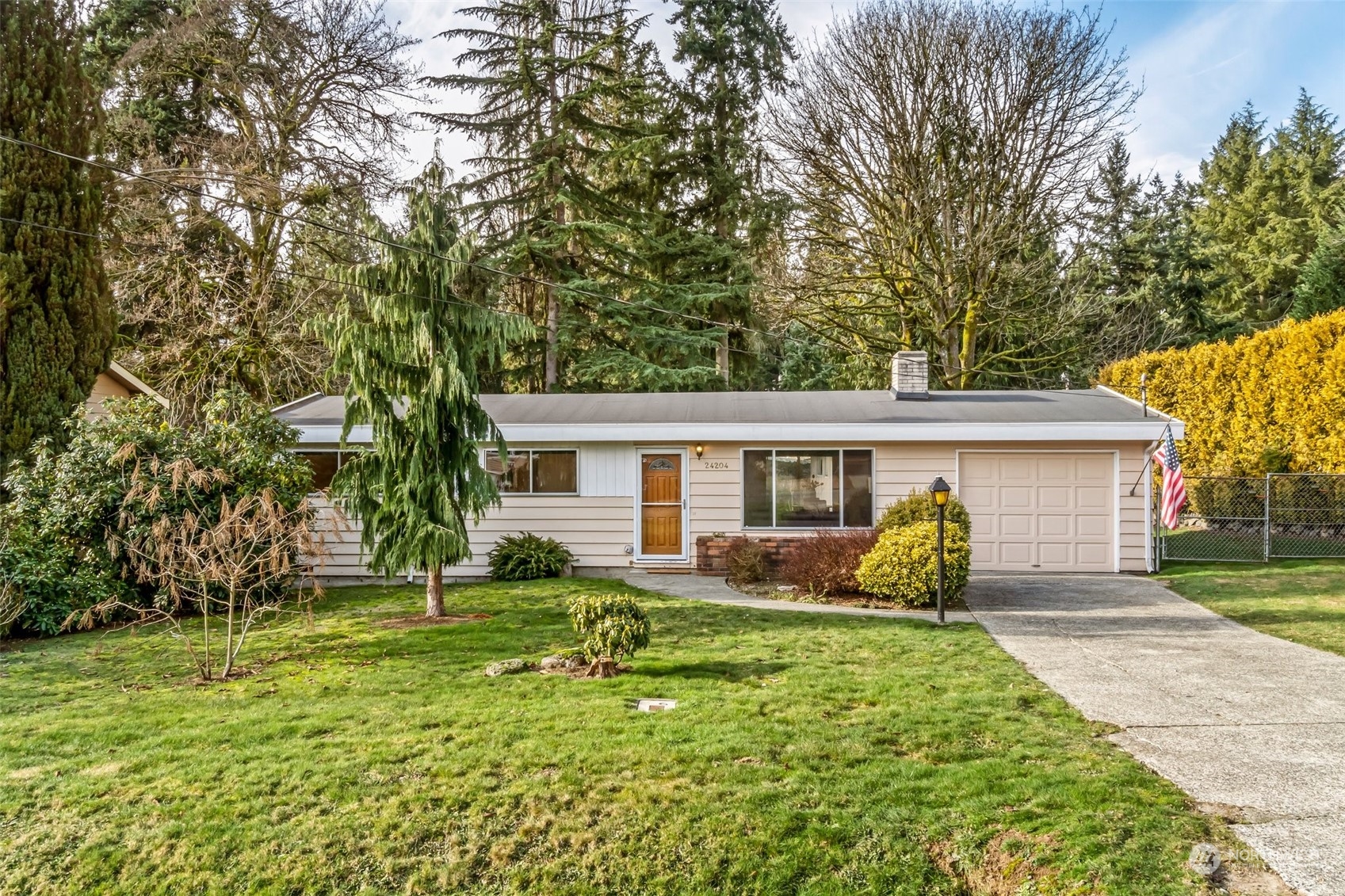 24204 2nd Place West Bothell, WA 98021 - Photo 2 of 34 a house view with a garden space