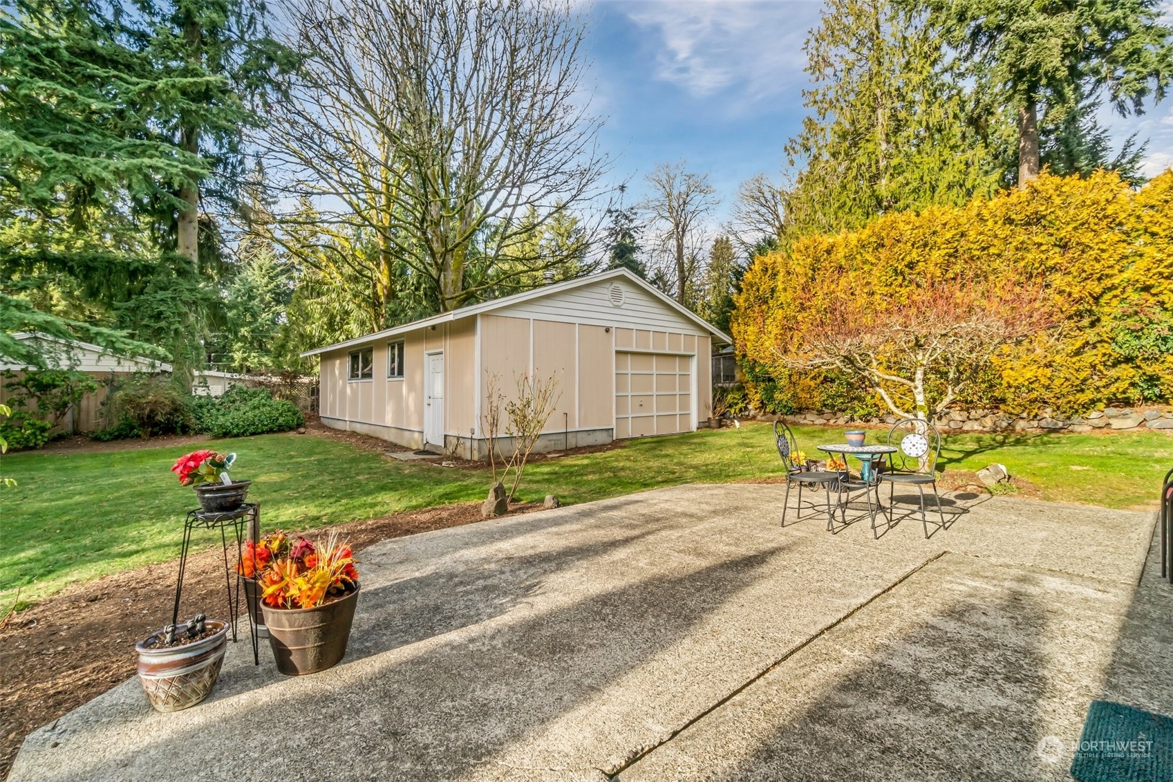24204 2nd Place West Bothell, WA 98021 - Photo 22 of 34 a view of a backyard with sitting area