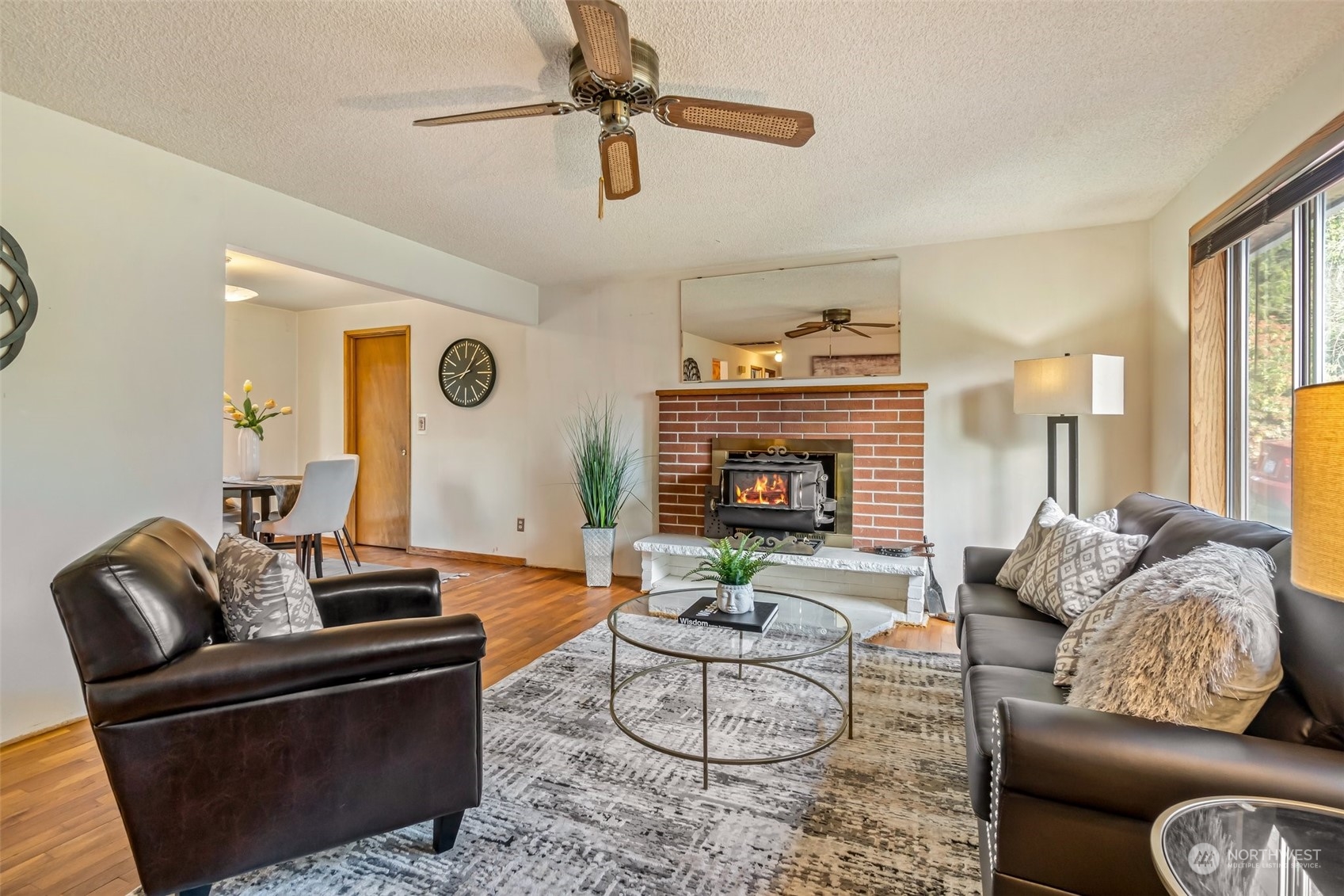 24204 2nd Place West Bothell, WA 98021 - Photo 5 of 34 a living room with furniture and a fireplace