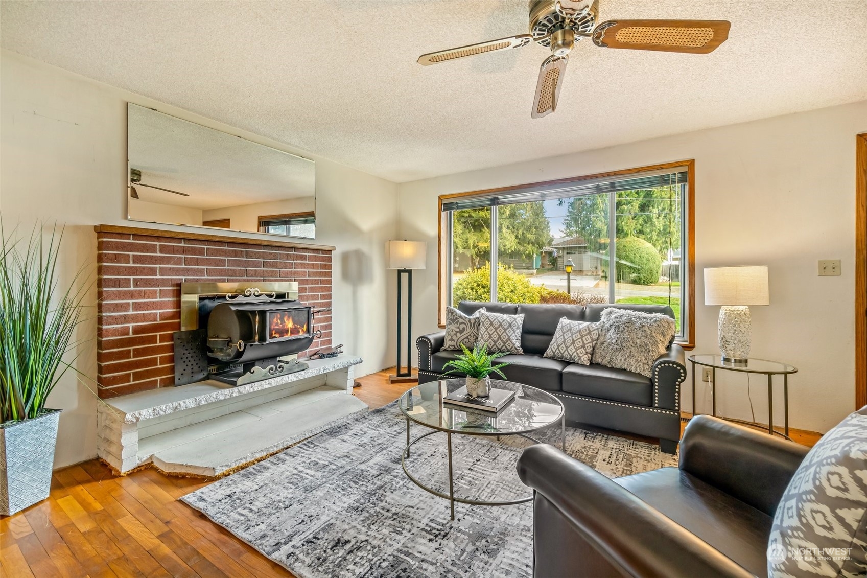 24204 2nd Place West Bothell, WA 98021 - Photo 7 of 34 a living room with furniture and a fireplace