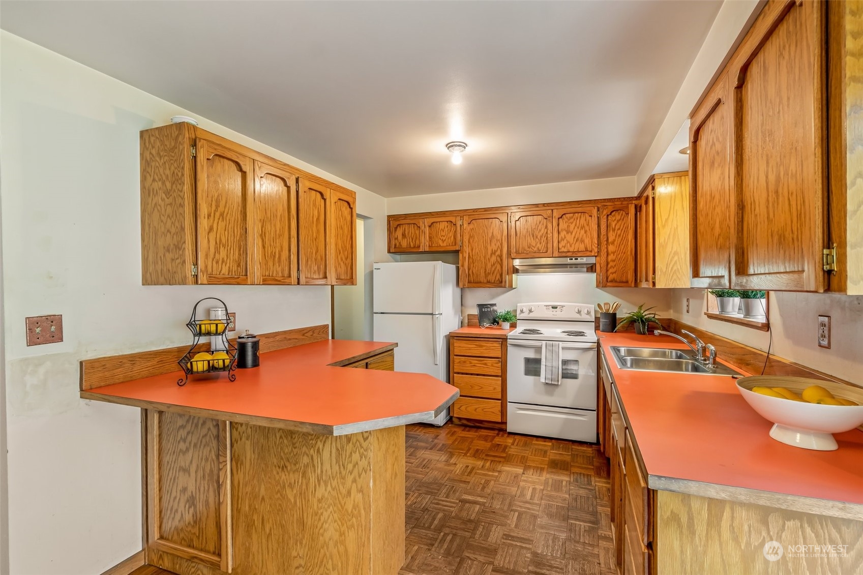 24204 2nd Place West Bothell, WA 98021 - Photo 10 of 34 a kitchen with stainless steel appliances granite countertop a sink stove and refrigerator