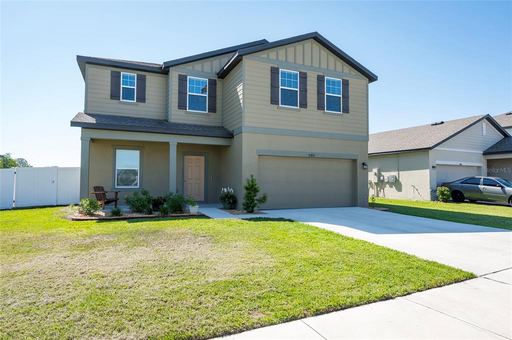 35853 Buttonweed Trail Zephyrhills, FL 33541 - Photo 1 of 1 a view of a house with swimming pool and a yard