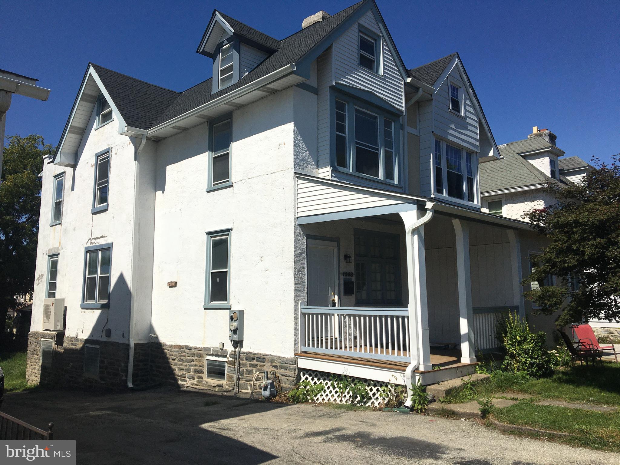 a view of a house with a porch