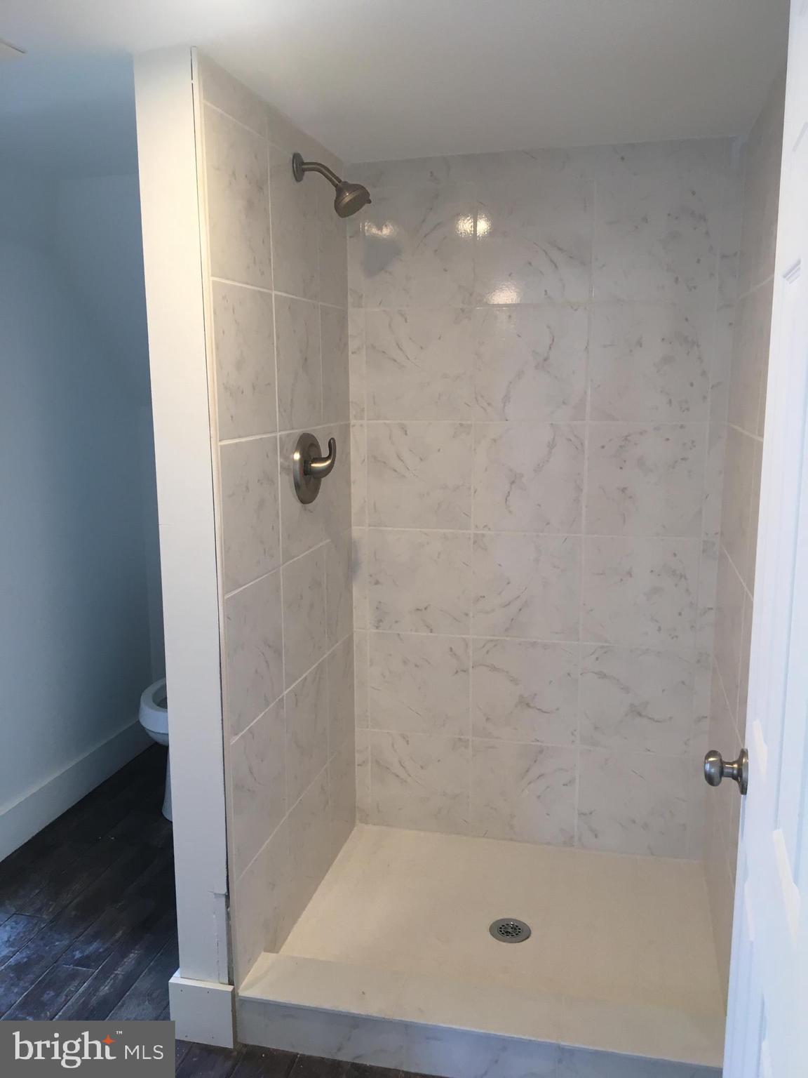 1908 Darby Road, Unit 2 Havertown, PA 19083 - Photo 12 of 14 a bathroom with a shower