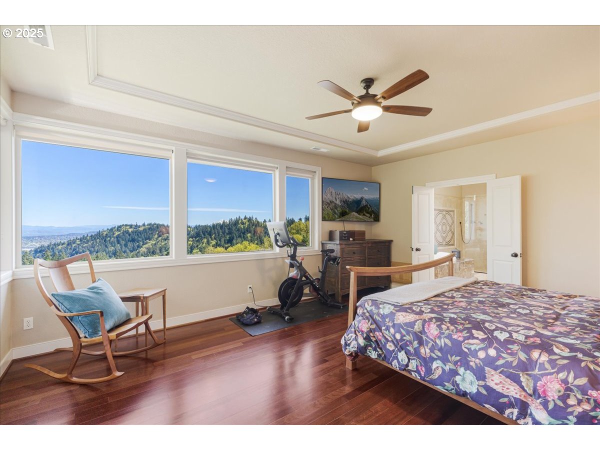6643 Northwest Meridian Ridge Drive Portland, OR 97210 - Photo 14 of 48 a living room with furniture and a large window