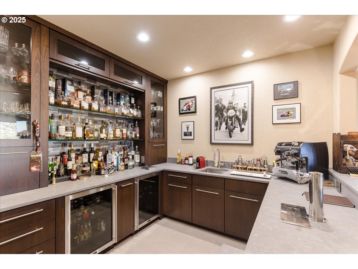 6643 Northwest Meridian Ridge Drive Portland, OR 97210 - Photo 25 of 48 a kitchen with a sink and cabinets