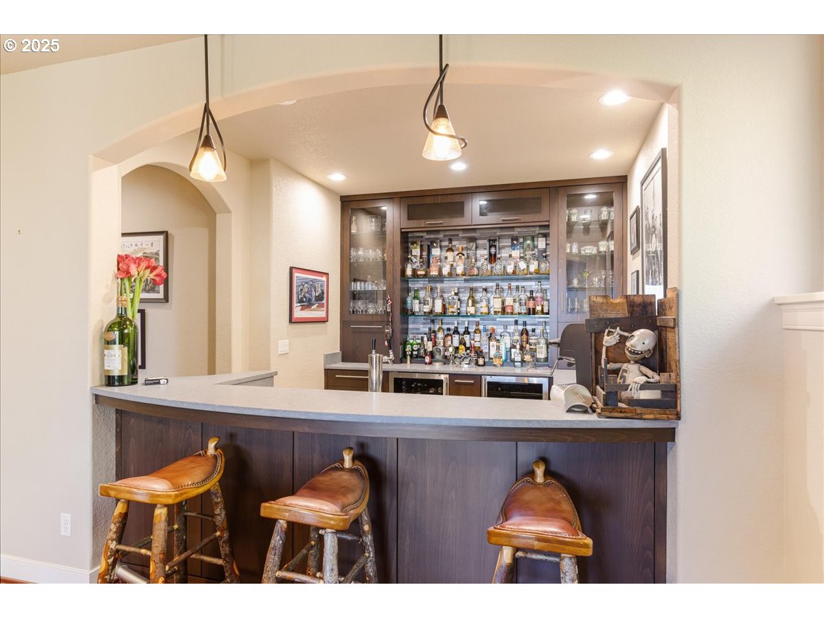 6643 Northwest Meridian Ridge Drive Portland, OR 97210 - Photo 27 of 48 a view of a room with shelves
