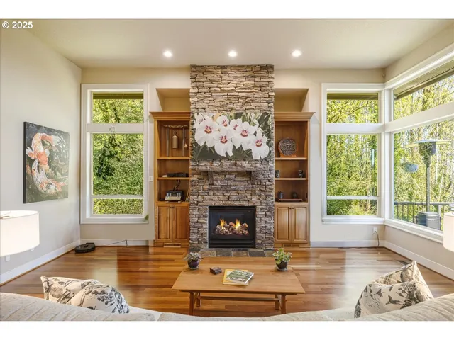 a living room with fireplace and a fireplace