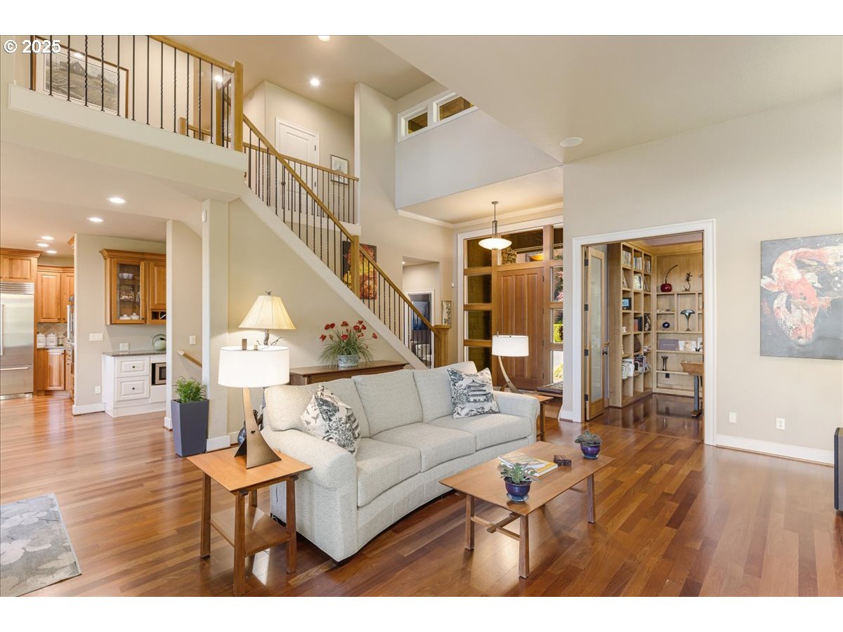 6643 Northwest Meridian Ridge Drive Portland, OR 97210 - Photo 7 of 48 a living room with furniture and wooden floor