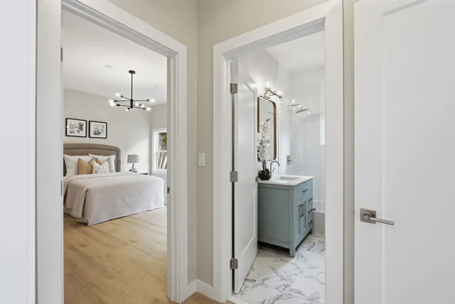 a en suite bathroom with a sink and a mirror