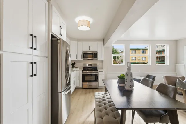 a view of a dining room with furniture