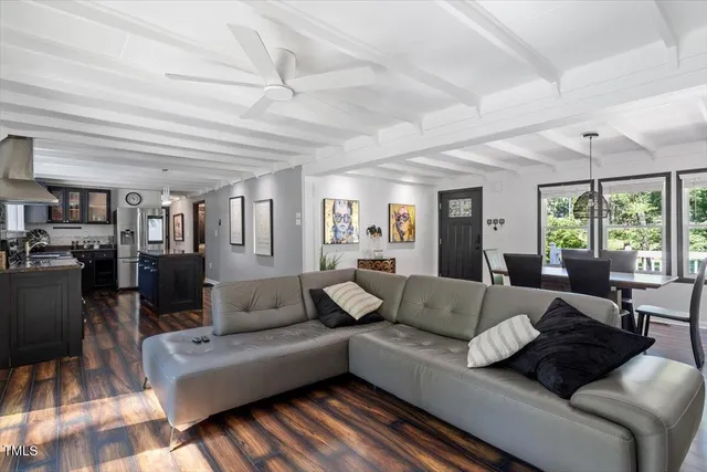 a kitchen with stainless steel appliances granite countertop a stove and a sink
