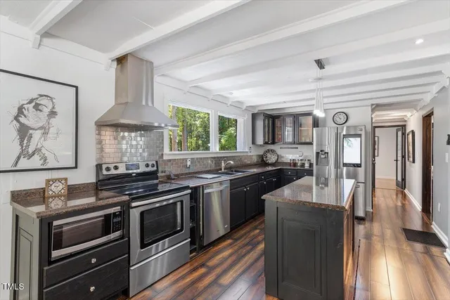 a view of a living room and dining room