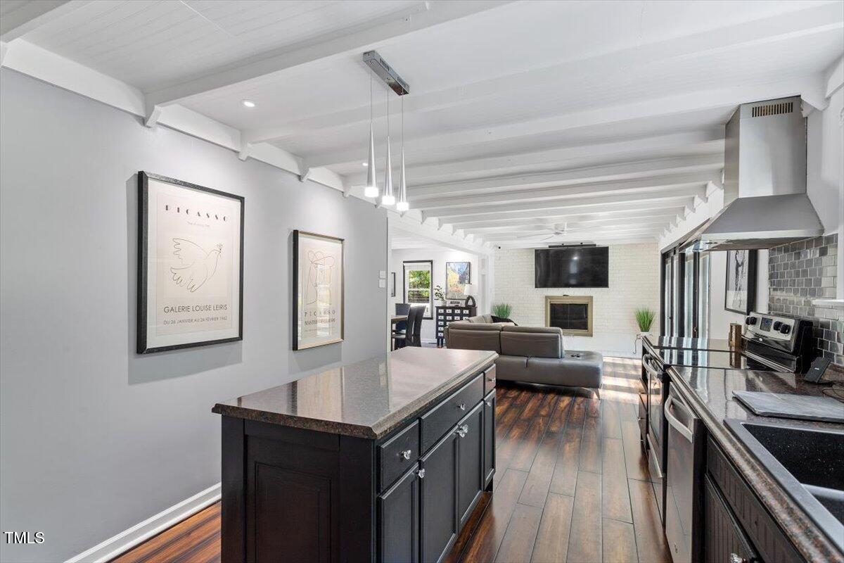 2129 Kelly Road Apex, NC 27502 - Photo 16 of 64 a view of a living room and dining room