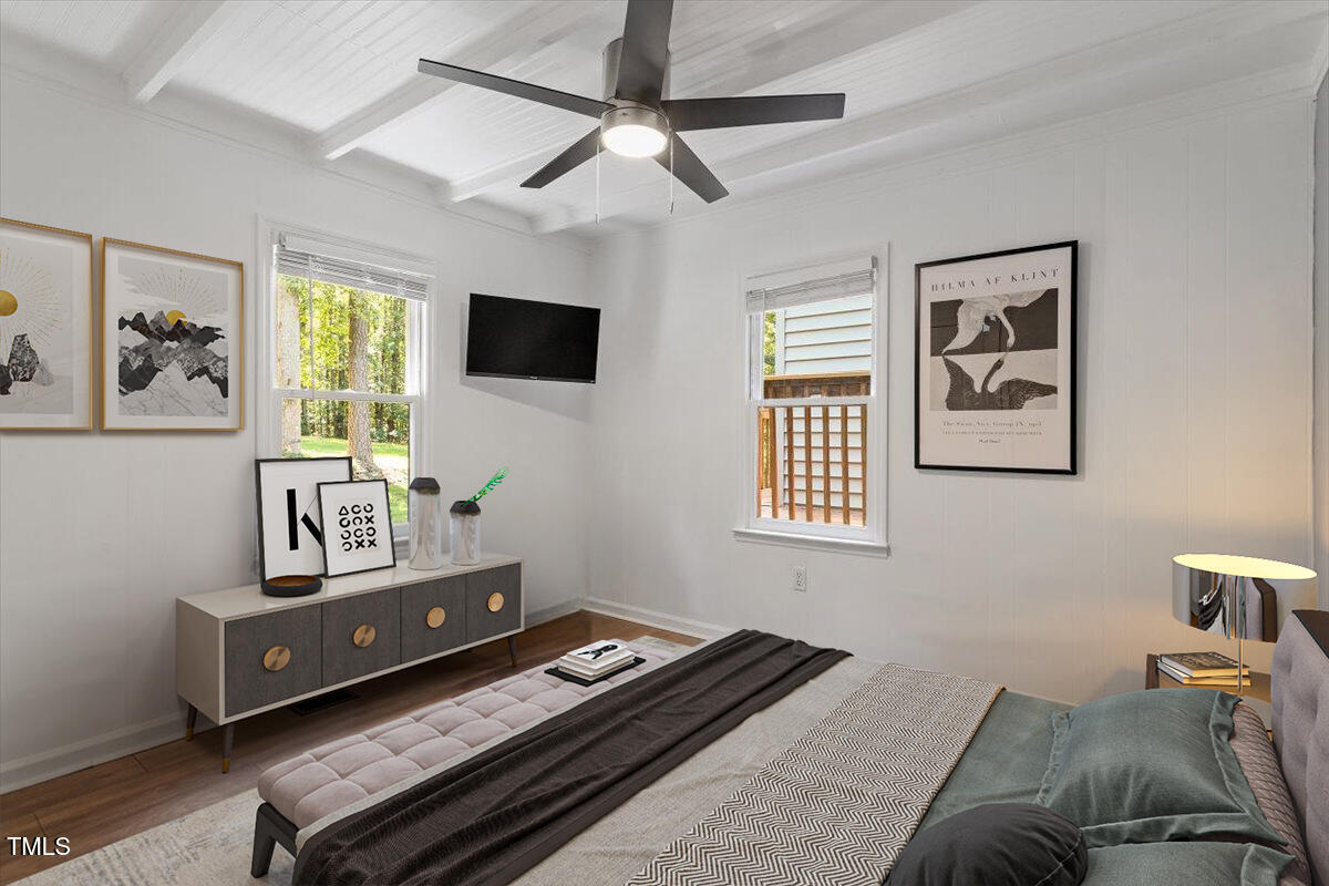 2129 Kelly Road Apex, NC 27502 - Photo 22 of 64 a living room with furniture and a flat screen tv