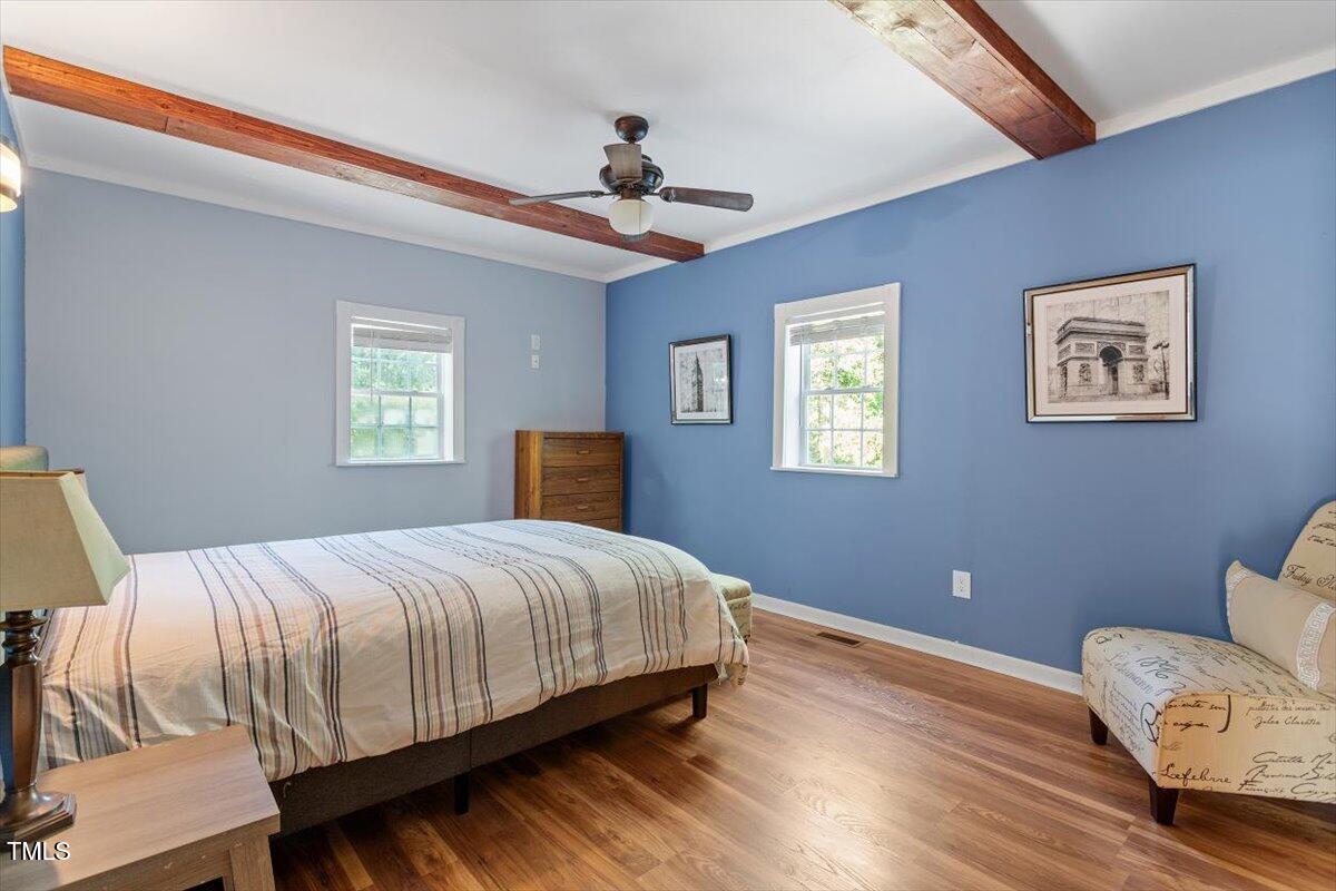 2129 Kelly Road Apex, NC 27502 - Photo 41 of 64 a bedroom with bed and window