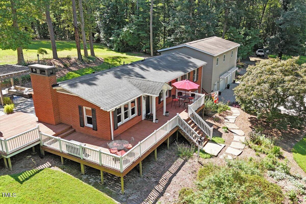 2129 Kelly Road Apex, NC 27502 - Photo 6 of 64 an aerial view of a house with a yard