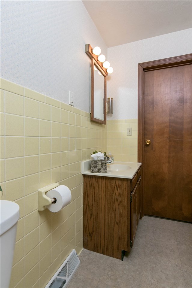 4861 Welsh Road Rockford, IL 61107 - Photo 11 of 21 a bathroom with a sink mirror and shower