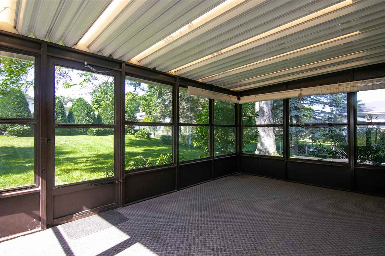4861 Welsh Road Rockford, IL 61107 - Photo 15 of 21 a view of an empty room with a large window