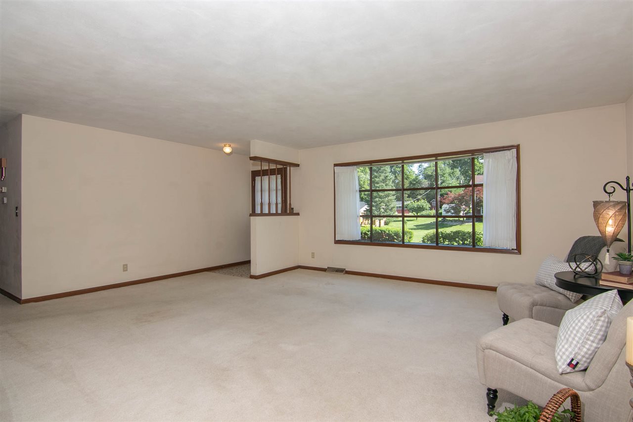 4861 Welsh Road Rockford, IL 61107 - Photo 3 of 21 a view of livingroom with furniture and window