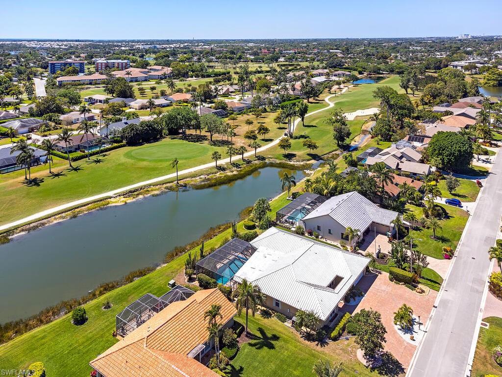 226 Torrey Pines Point Naples, FL 34113 - Photo 3 of 27 Birds eye view of property with a water view, view of golf course, and a residential view