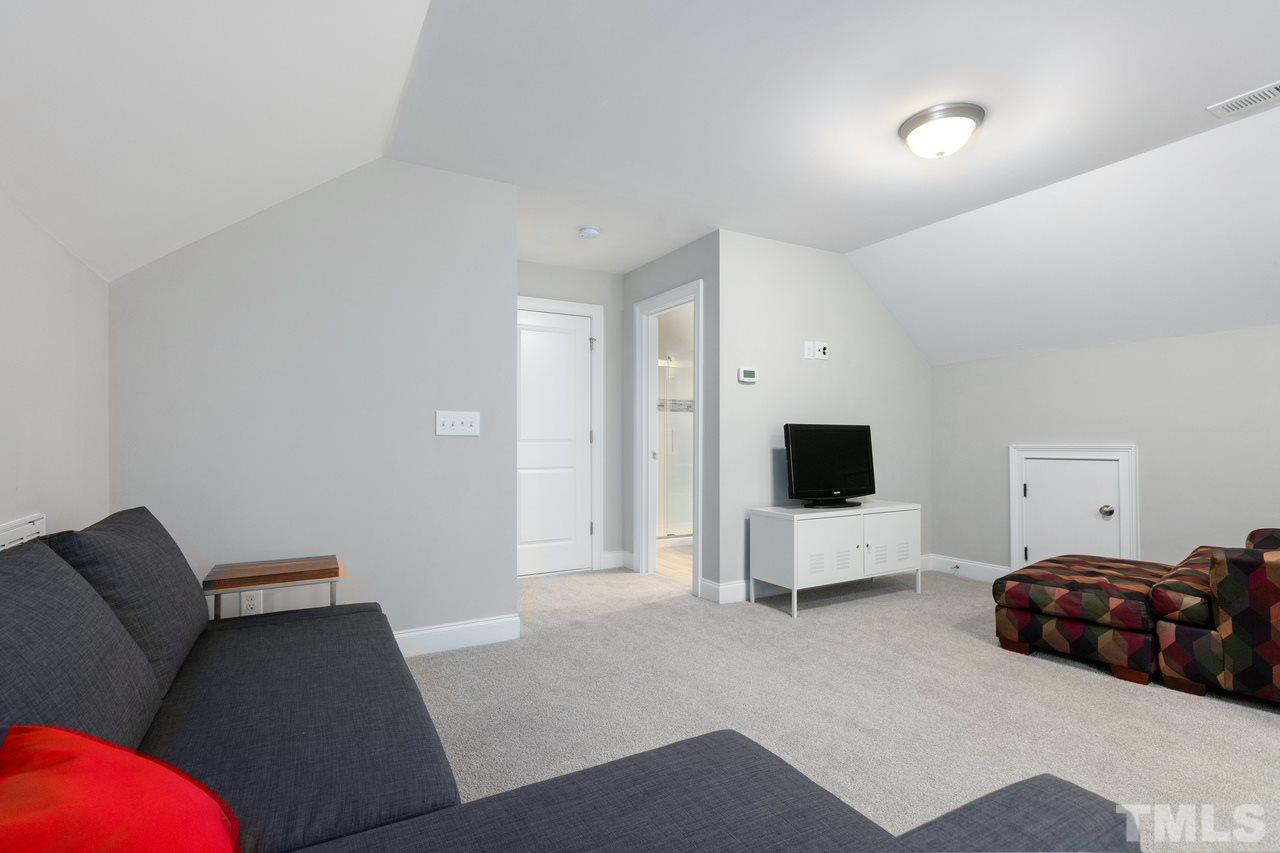 1612 Yates Wheel Way Raleigh, NC 27606 - Photo 26 of 30 1612 Yates Wheel Way - 3rd floor bonus area/loft