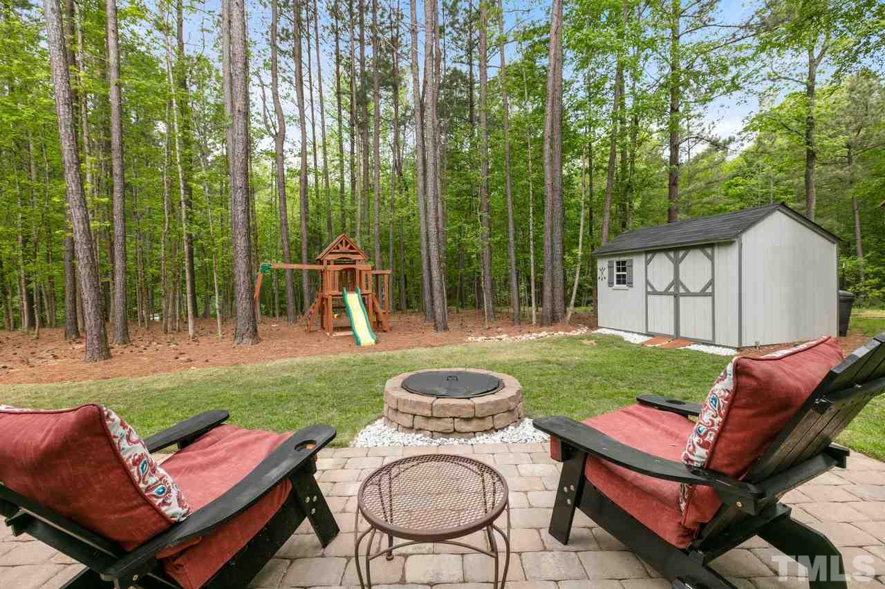 1612 Yates Wheel Way Raleigh, NC 27606 - Photo 29 of 30 1612 Yates Wheel Way - Patio with firepit