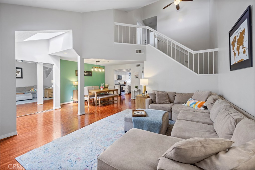 8520 Lake Knoll Avenue, Unit B Garden Grove, CA 92844 - Photo 6 of 31 a living room with furniture and wooden floor